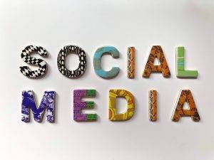 social media written with different colored letters